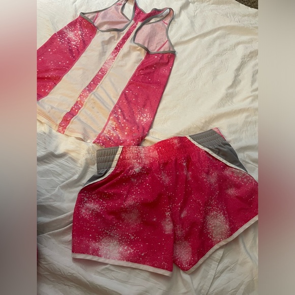 One pair of Adidas, running shorts, large, and one Nike short set, medium - Picture 7 of 9